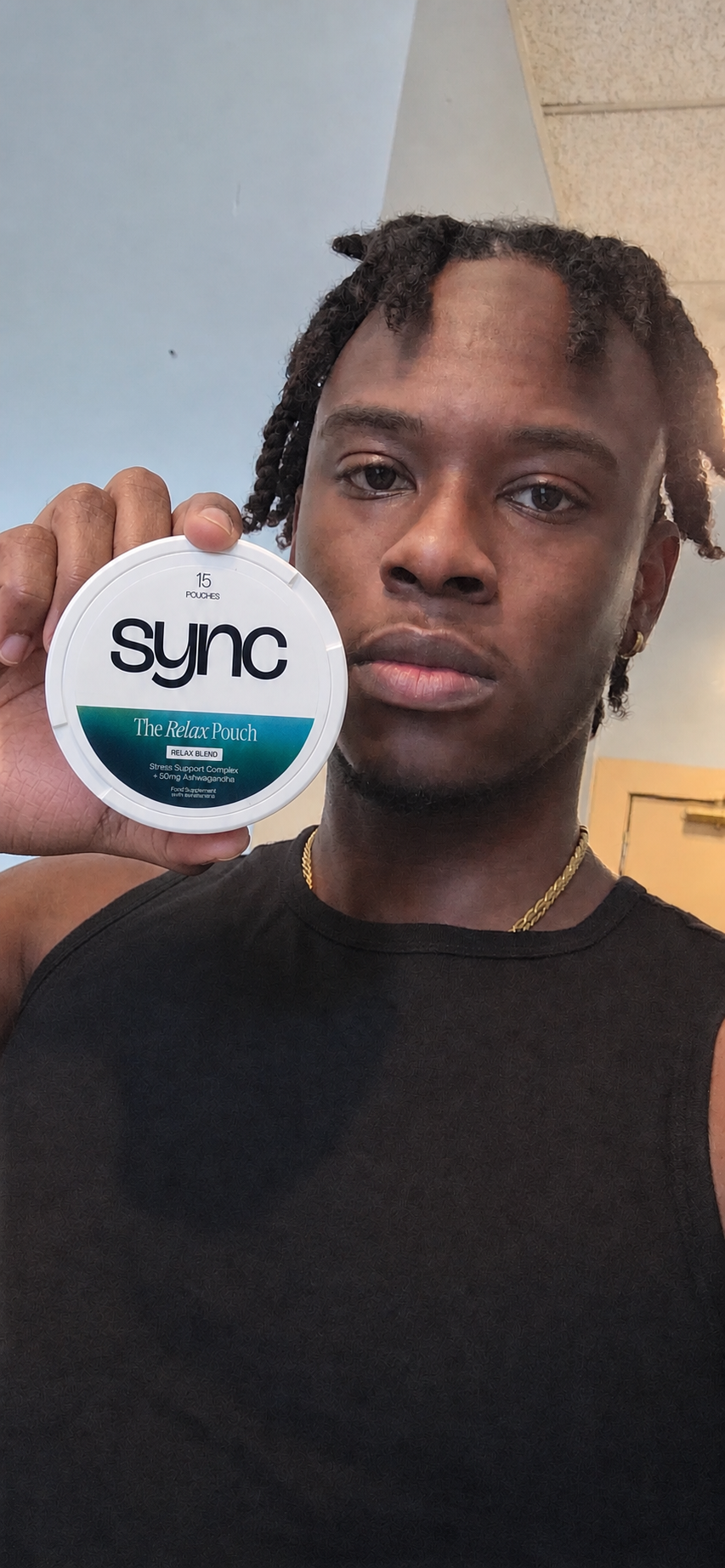 Man holding The Relax Pouch by Sync
