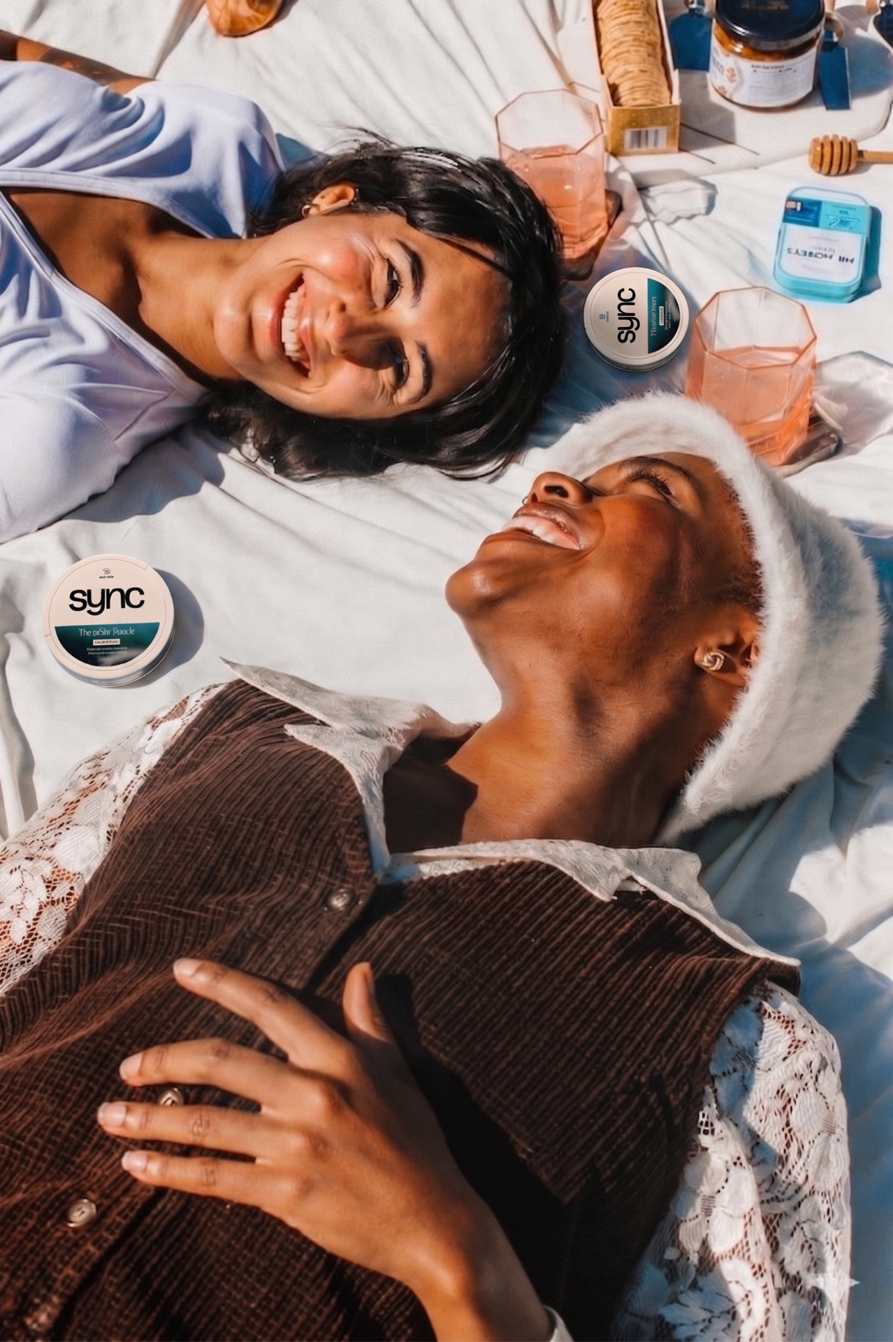 Friends relaxing outdoors with Sync pouches